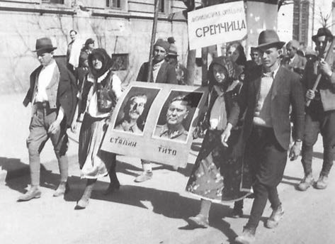Portraits of Stalin and Tito at postwar demonstration in Belgrade