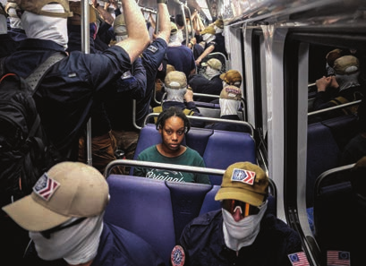 Black woman surrounded by Patriot Front fascists