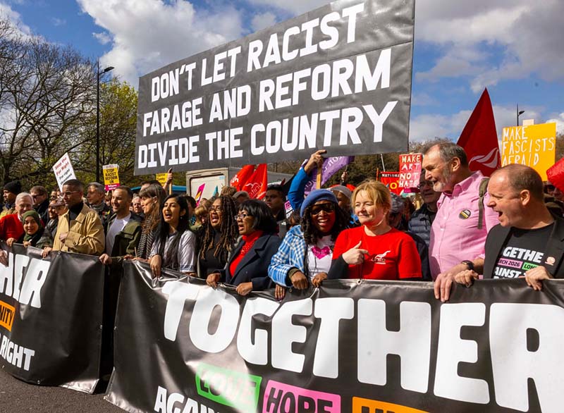 Together Alliance banner reads Don't let racist Farage and Reform divide the country